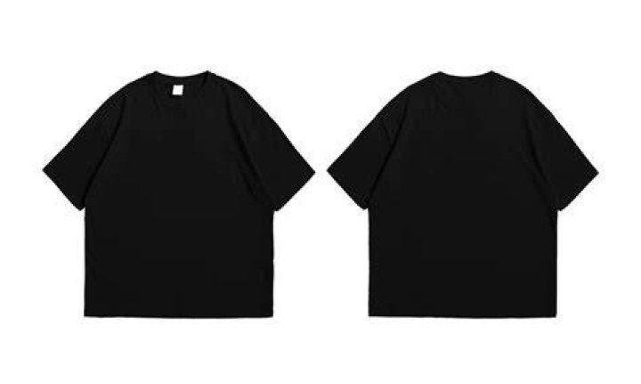 a black t shirt with a picture of a person on it a black t shirt with a picture of a person on it