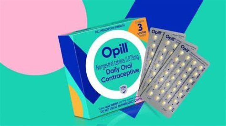 opill a box of opill set against a pink and purple background