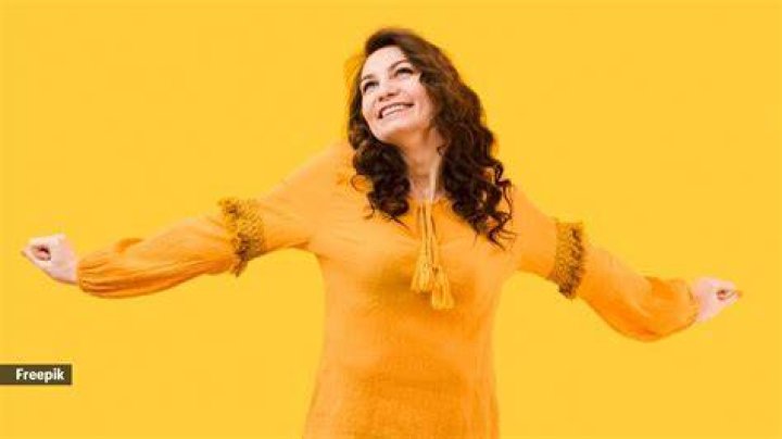 a person in a yellow dress a person in a yellow dress