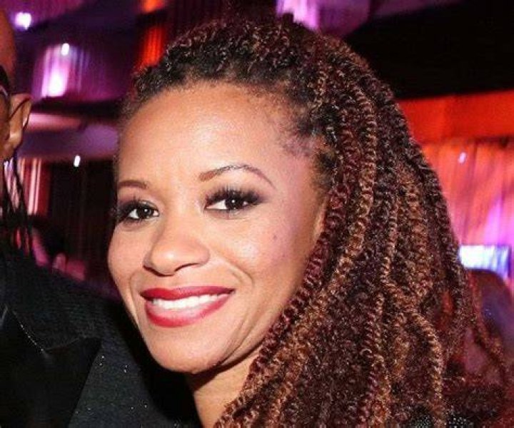 A photo of Tomeeka Robyn Bracy with her husband Stevie Wonder