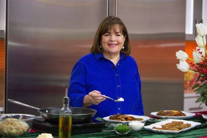 Barefoot Contessa Ina Garten smiles as she stands in front of the counter inside the "barn" on her property in East Hampton, New York.