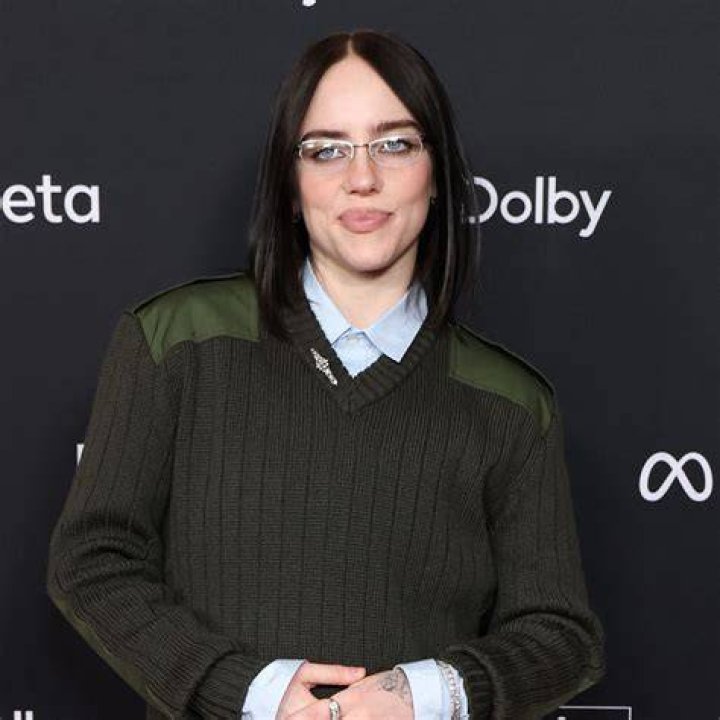 Billie Eilish poses at an event.