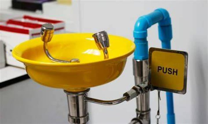 Does a plumbed eyewash station use regular tap water?