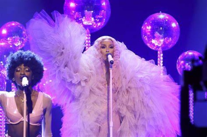 Doja Cat performs on stage.