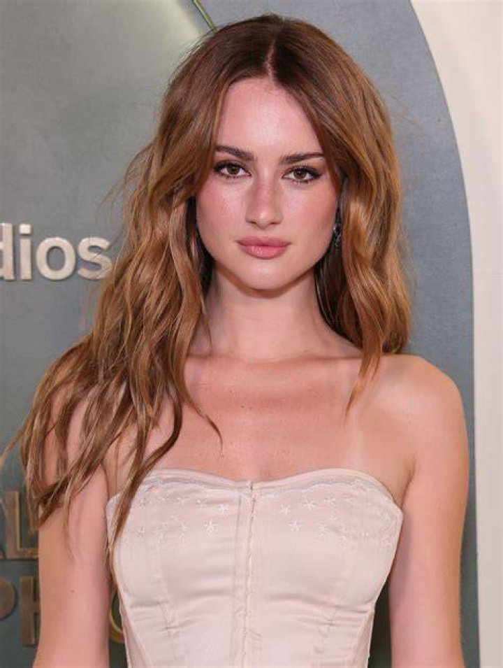 Grace Van Patten, whose character Lucy reveals a secret to her mother in 'Tell Me Lies' Season 1 Episode 9: 'Sugar, We're Going Down Swinging,' looks on in a scene from 'Tell Me Lies'