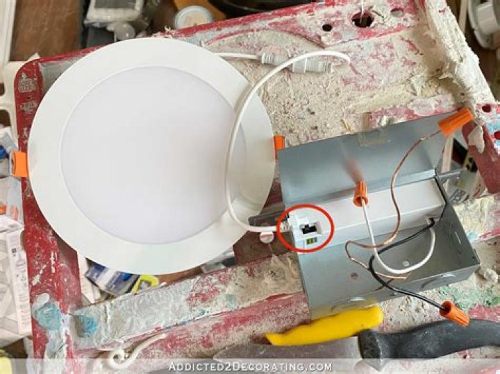 How do you install recessed lights in an existing circuit?