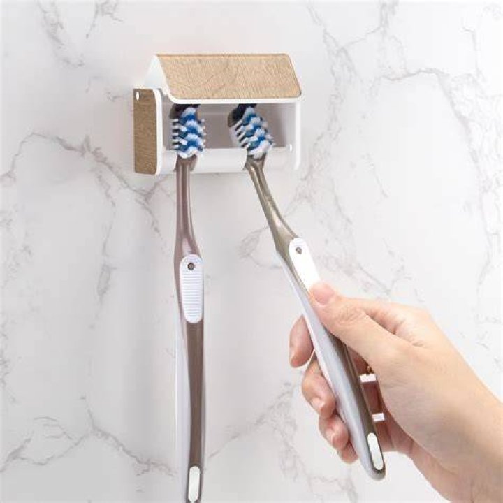 How do you remove soap and toothbrush holders from wall tiles?