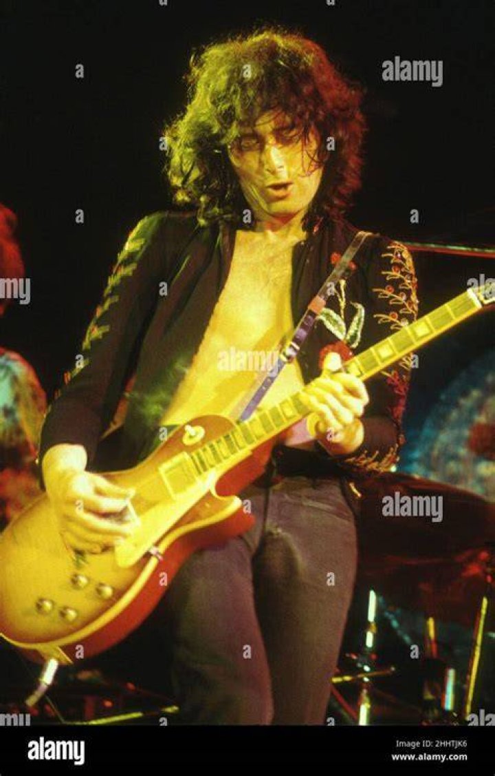 Jimmy Page performs with Led Zeppelin in Amsterdam in 1972; Eddie Van Halen uses his finger-tapping technique to play guitar with Van Halen in 1986.