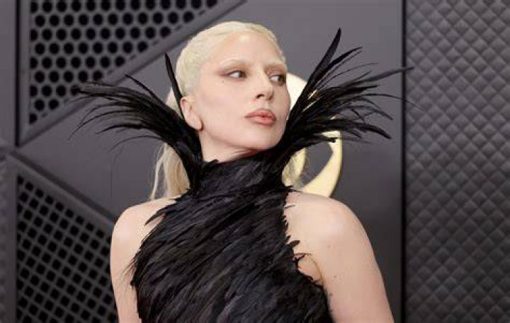 Lady Gaga emerging from an egg