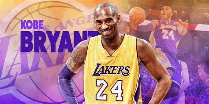 Late NBA player Kobe Bryant smiling at a promotional event organized by Nike