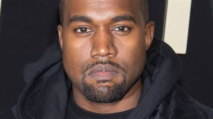 The Real Reason Kanye West Never Smiles in Photos