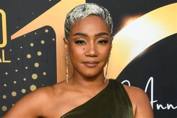 Tiffany Haddish, who was once homeless, smiling for a photo