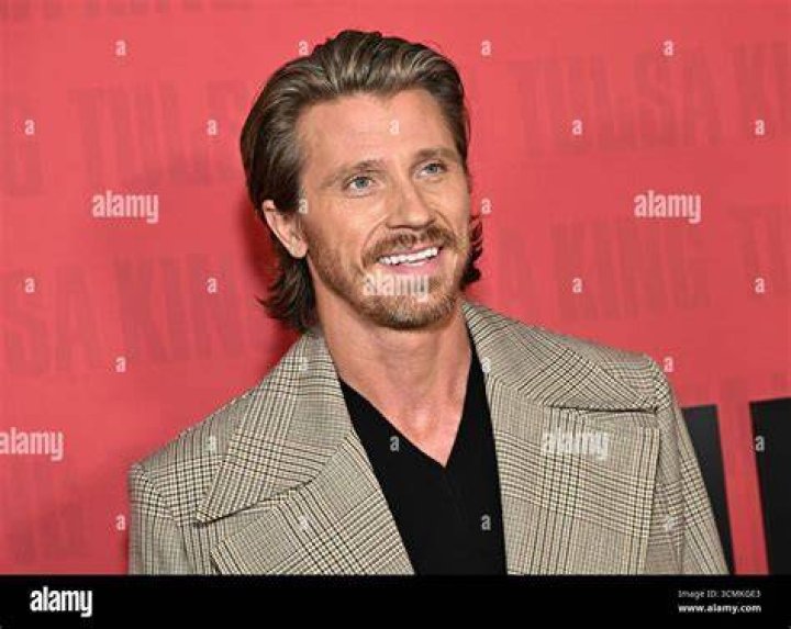 Tulsa King star Garrett Hedlund poses as he arrives for the premiere of 'Triple Frontier' at Callao Cinema in Madrid
