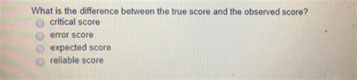 What is the difference between a true score and an observed score?