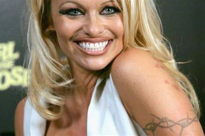 When Did Pamela Anderson Get Her Barbed Wire Tattoo Removed?