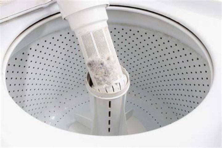 Where is the lint trap on my Kenmore washer?